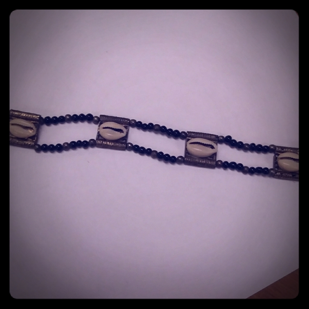 Crowie shell necklace.